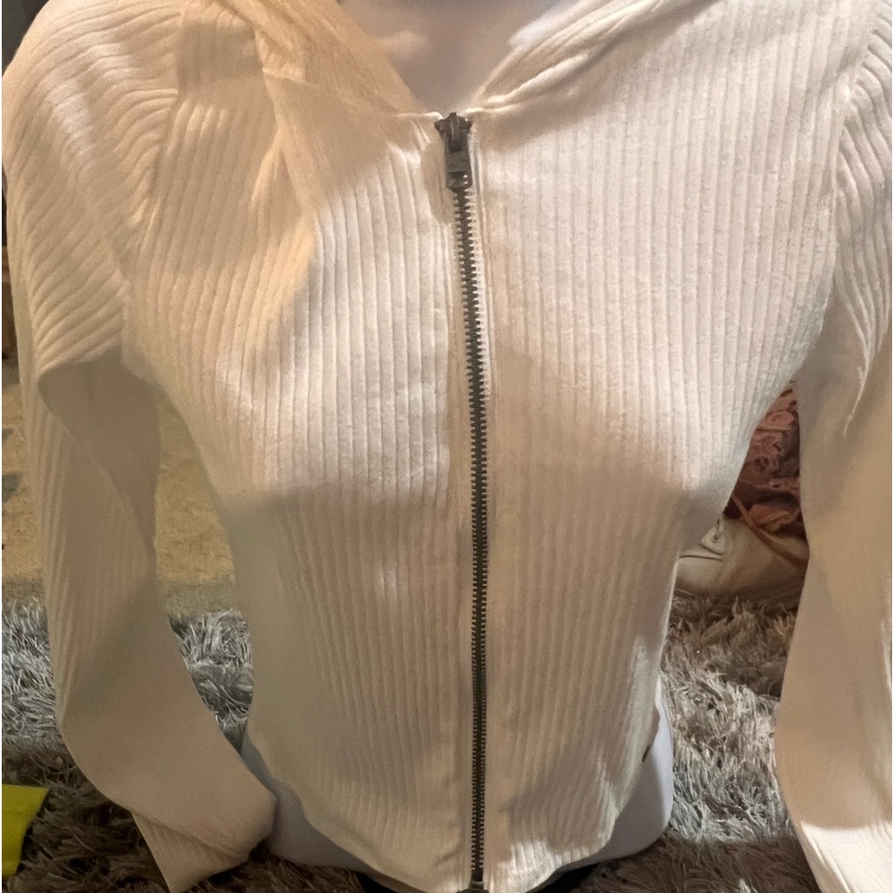 White zip up w hood.